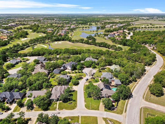 4304 Newcastle Ct, Bryan, TX 77802 - aerial view of property's location with nearby suburban area, a large body of water, and a golf club