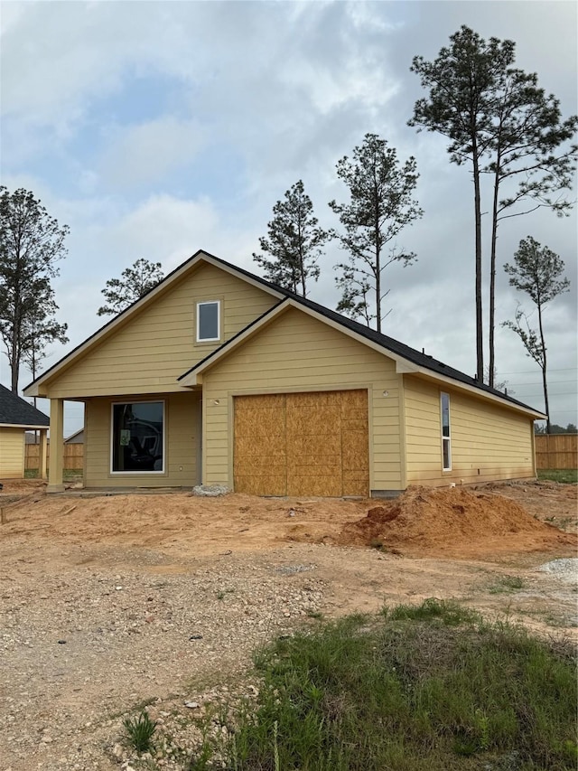 view of front of home with an attached garage and driveway