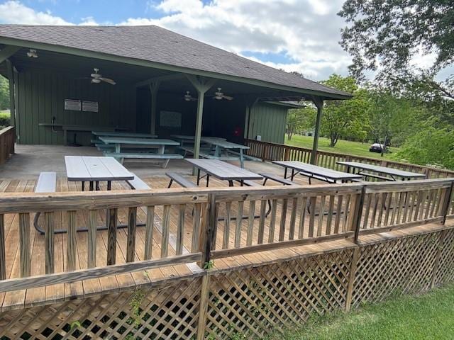 11 Ridgeway St, Coldspring, TX 77331 - wooden terrace with outdoor dining space, a patio, and ceiling fan