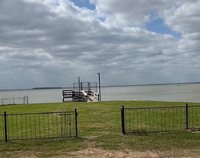 11 Ridgeway St, Coldspring, TX 77331 - view of yard with fence and a water view