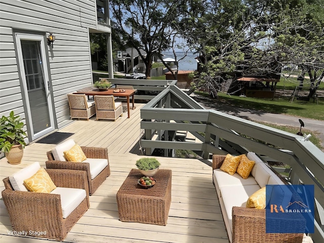 11 Ridgeway St, Coldspring, TX 77331 - deck with outdoor dining space and an outdoor hangout area