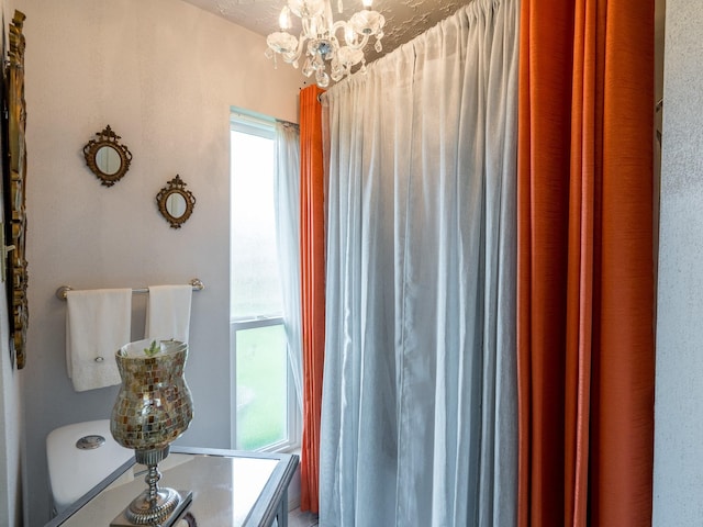 1814 Cliffdale Dr, Missouri City, TX 77489 - interior space with a healthy amount of sunlight and a notable chandelier