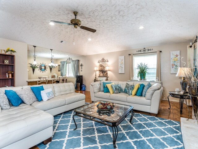 1814 Cliffdale Dr, Missouri City, TX 77489 - living room featuring a ceiling fan, wood finished floors, a textured ceiling, visible vents, and recessed lighting