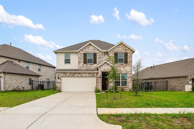 546 Long Beach Bay Dr, Katy, TX 77493 - view of front of house with an attached garage, driveway, fence, and a front yard