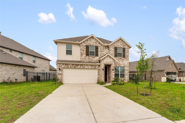 546 Long Beach Bay Dr, Katy, TX 77493 - view of front of property with a garage, concrete driveway, a front lawn, and fence