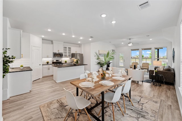 546 Long Beach Bay Dr, Katy, TX 77493 - dining room with ceiling fan, light wood-style floors, visible vents, and recessed lighting