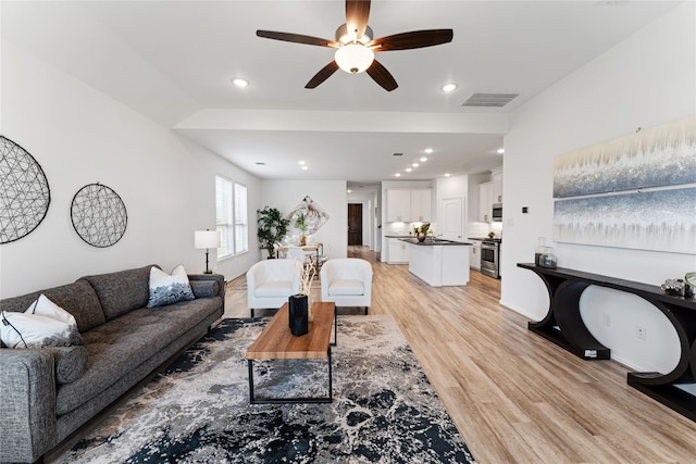 546 Long Beach Bay Dr, Katy, TX 77493 - living area with recessed lighting, light wood-style flooring, visible vents, and a ceiling fan