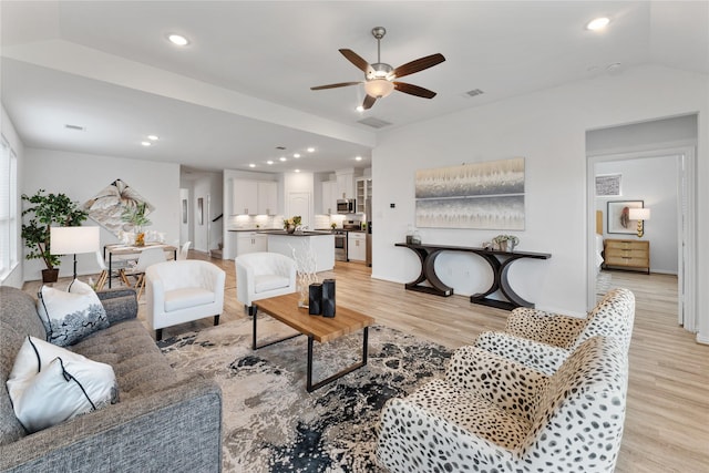 546 Long Beach Bay Dr, Katy, TX 77493 - living room with recessed lighting, light wood finished floors, visible vents, a ceiling fan, and baseboards