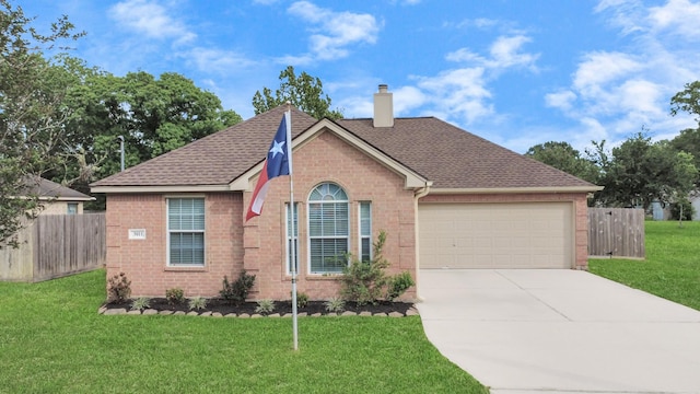 3011 Fairchild Ave, Needville, TX 77461 - ranch-style house with fence, concrete driveway, brick siding, and a garage