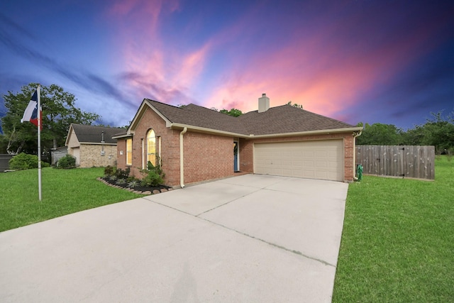 3011 Fairchild Ave, Needville, TX 77461 - ranch-style house with concrete driveway, brick siding, fence, and a garage