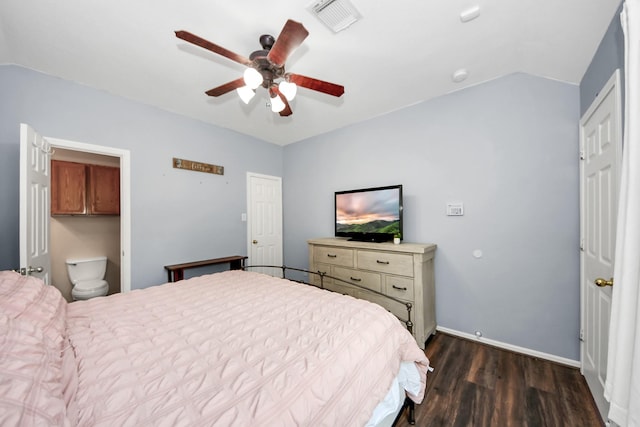 3011 Fairchild Ave, Needville, TX 77461 - bedroom with dark wood-style floors, vaulted ceiling, visible vents, baseboards, and a ceiling fan