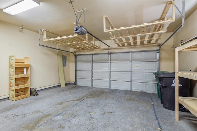 91 Sidney St, Houston, TX 77003 - garage with a garage door opener and electric panel