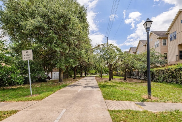 91 Sidney St, Houston, TX 77003 - view of community featuring a lawn
