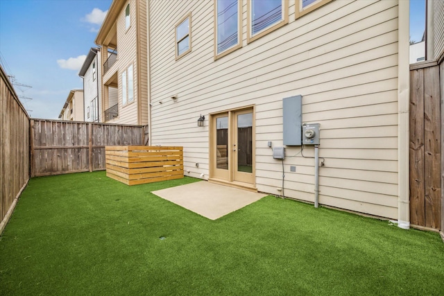4958 Edison Park Ln, Houston, TX 77081 - rear view of property featuring a fenced backyard and a lawn
