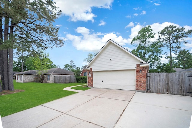 606 Sea Anchor Way, Crosby, TX 77532 - garage with concrete driveway and fence