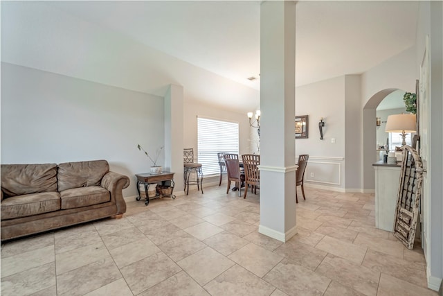 606 Sea Anchor Way, Crosby, TX 77532 - living room with an inviting chandelier and arched walkways