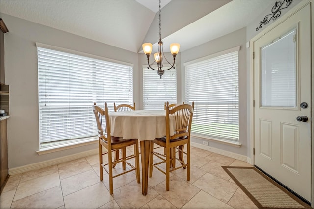 606 Sea Anchor Way, Crosby, TX 77532 - dining space featuring an inviting chandelier, light tile patterned flooring, vaulted ceiling, and baseboards