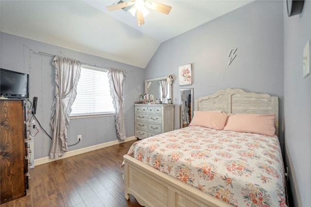 606 Sea Anchor Way, Crosby, TX 77532 - bedroom featuring dark wood-type flooring, vaulted ceiling, a ceiling fan, and baseboards