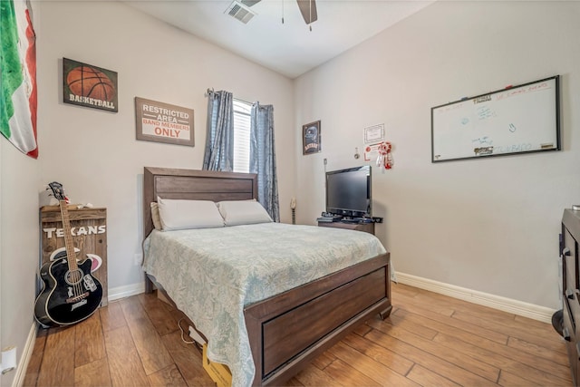 606 Sea Anchor Way, Crosby, TX 77532 - bedroom featuring baseboards, visible vents, ceiling fan, and light wood-style flooring