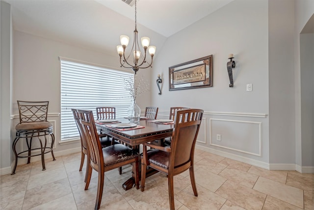 606 Sea Anchor Way, Crosby, TX 77532 - dining room featuring an inviting chandelier, a wealth of natural light, lofted ceiling, and wainscoting