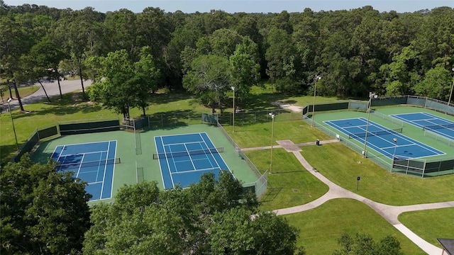 606 Sea Anchor Way, Crosby, TX 77532 - drone / aerial view featuring a wooded view