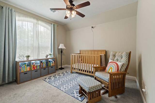 13115 Parkbrook Way Ln, Sugar Land, TX 77498 - carpeted bedroom with baseboards, a nursery area, a ceiling fan, and vaulted ceiling