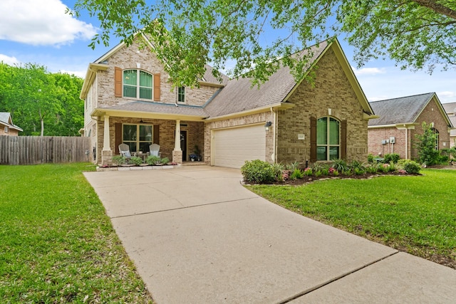 13115 Parkbrook Way Ln, Sugar Land, TX 77498 - traditional-style home featuring covered porch, an attached garage, driveway, brick siding, and a shingled roof
