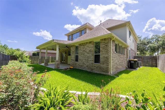 13115 Parkbrook Way Ln, Sugar Land, TX 77498 - rear view of house featuring ceiling fan, a patio area, and brick siding