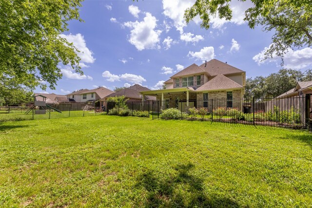 13115 Parkbrook Way Ln, Sugar Land, TX 77498 - back of property featuring a playground