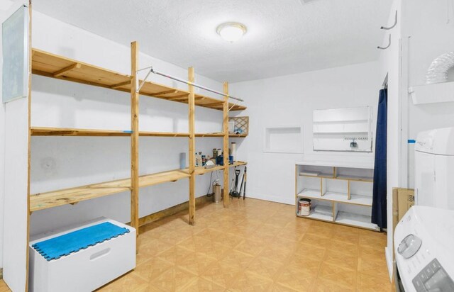 storage featuring washer / clothes dryer