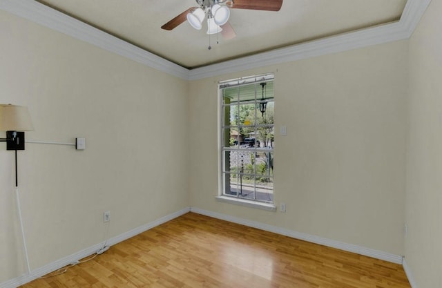 unfurnished room with ceiling fan, wood finished floors, and ornamental molding