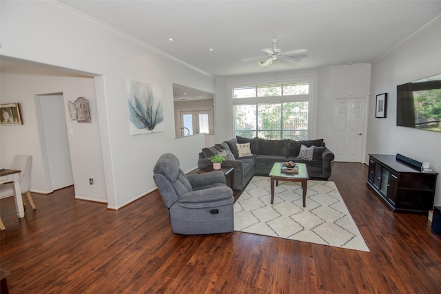 living area with a ceiling fan, dark wood-style floors, recessed lighting, and ornamental molding