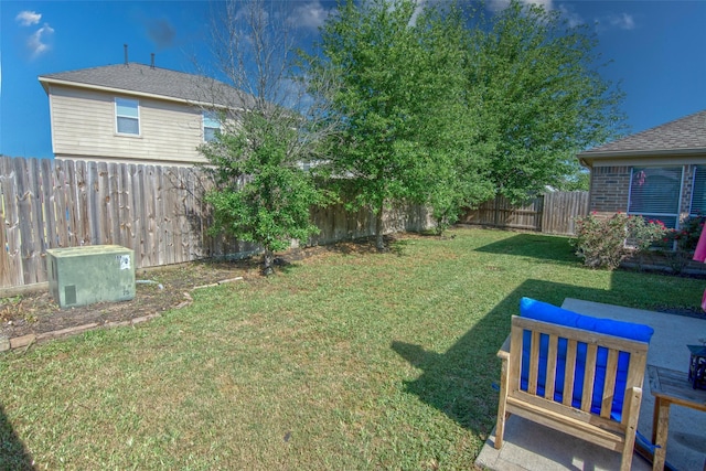 view of yard featuring a fenced backyard