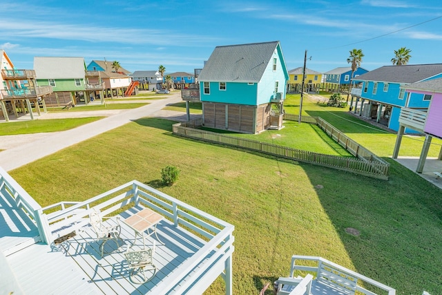 birds eye view of property with a residential view