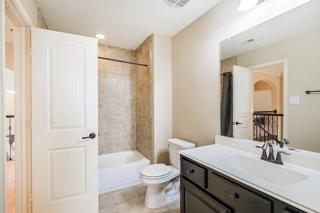 full bath with tile patterned floors, visible vents, shower / bath combination, toilet, and vanity