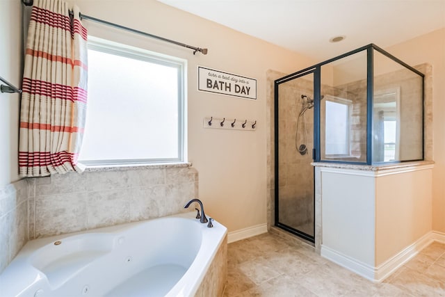 bathroom with baseboards, tile patterned floors, a stall shower, and a tub with jets