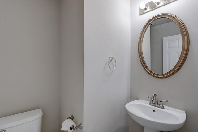 3126 Pebble Bay Dr, League City, TX 77573 - half bath featuring a sink and toilet