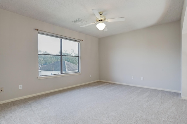 3126 Pebble Bay Dr, League City, TX 77573 - unfurnished room with light colored carpet, ceiling fan, baseboards, and visible vents