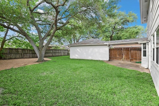 view of yard with a fenced backyard