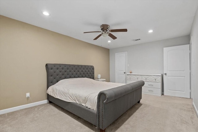 bedroom with a ceiling fan, light carpet, baseboards, visible vents, and recessed lighting