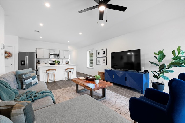 24343 Elmwood Falls Dr, Spring, TX 77373 - living room featuring light wood-style floors, ceiling fan, recessed lighting, and baseboards