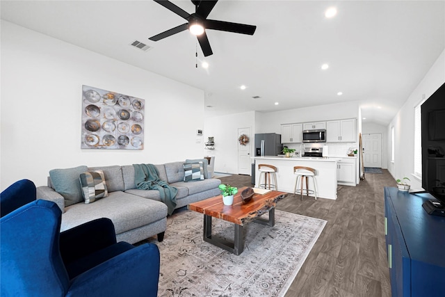 24343 Elmwood Falls Dr, Spring, TX 77373 - living room with dark wood-style floors, a ceiling fan, and recessed lighting
