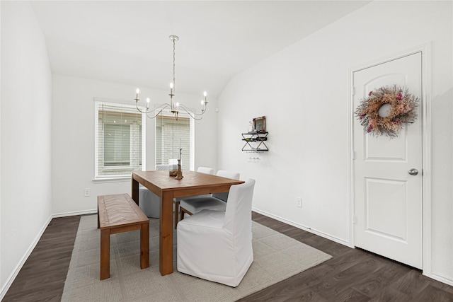 24343 Elmwood Falls Dr, Spring, TX 77373 - dining space featuring a chandelier, dark wood-style flooring, lofted ceiling, and baseboards
