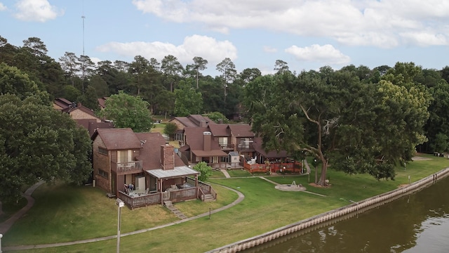 bird's eye view with a water view