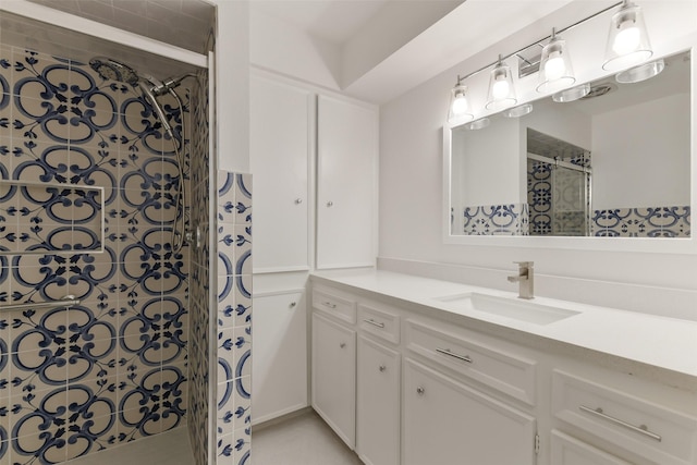 full bathroom featuring vanity and a stall shower