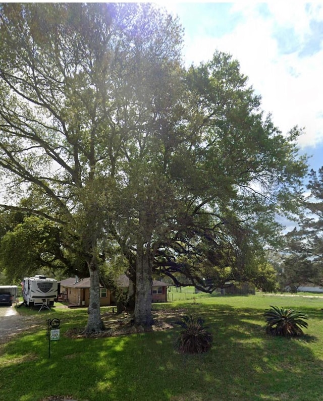 exterior space featuring a front lawn