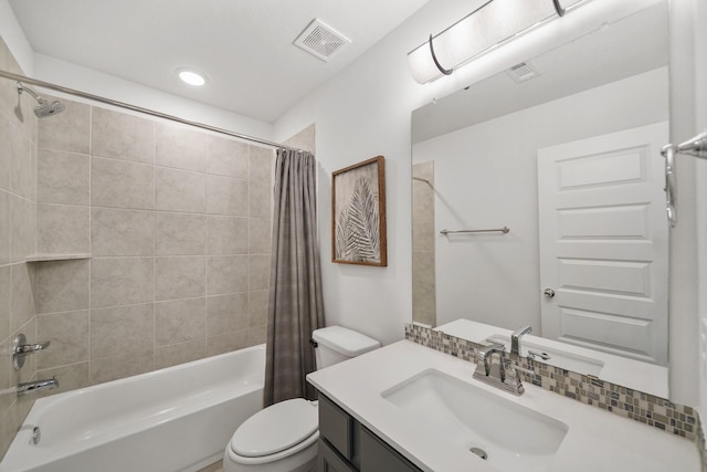 full bath featuring shower / bath combo, visible vents, vanity, and toilet