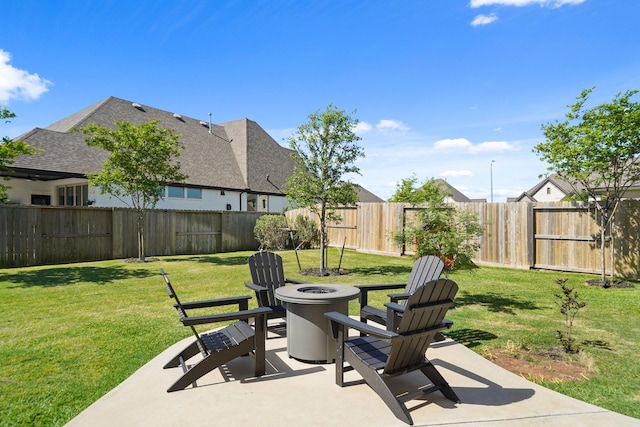view of patio featuring a fire pit and a fenced backyard