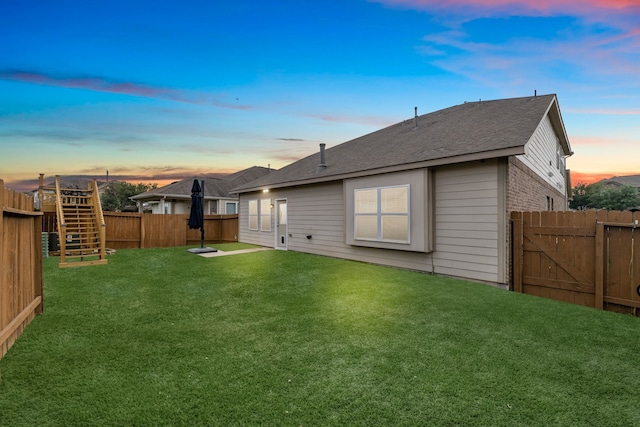 9974 Stone Creek Ln, Brookshire, TX 77423 - back of house with roof with shingles