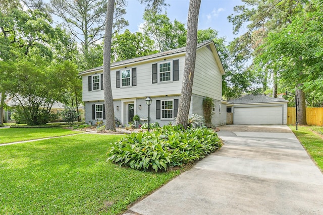 colonial-style house featuring brick siding, driveway, a front lawn, and fence